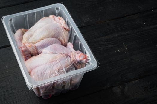 Whole raw chicken meat package with copy space for text