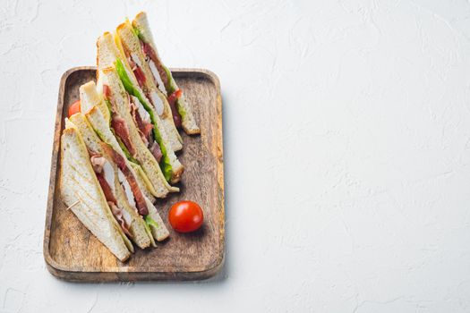 Classic club sandwich with meat, on white background with copy space for text