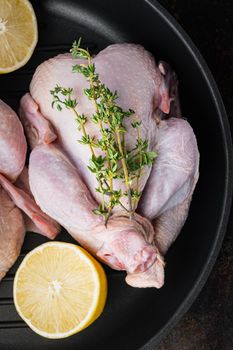 Fresh raw chicken meat on grill pan, on old rustic background, top view