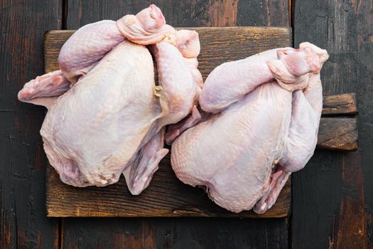 Fresh whole poult meat, on old wooden table, top view