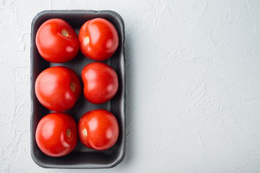 Red tomatoes, on white background with copy space for text