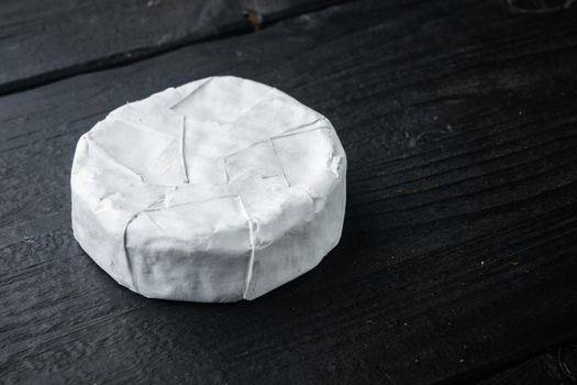 Farm cheese camembert set, on black wooden background with copy space for text