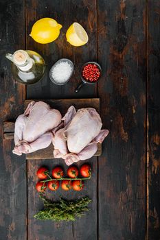 Fresh whole poult meat with ingredients, on old wooden table, top view with copy space for text