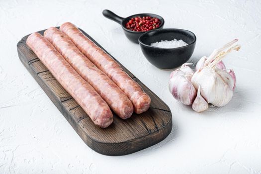 Traditional beef sausages, on white background.