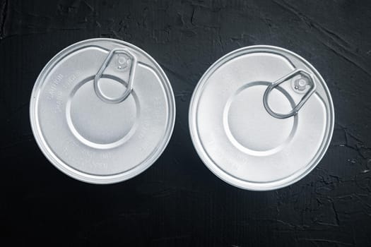 Canned sauce tin can, on black background, top view or flat lay