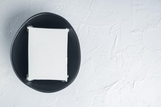 Homemade greek cheese feta set, on white background, flat lay with copy space for text