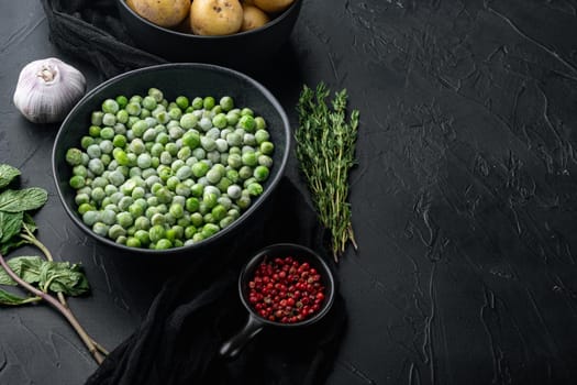 Green peas set, on black textured background with copy space