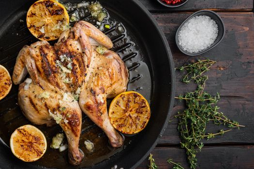 Homemade roasted chicken food, on old wooden table, top view