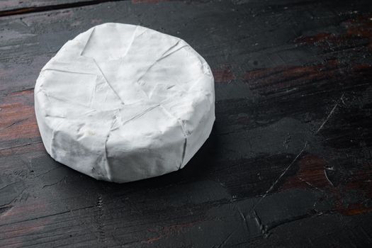 Farm cheese camembert set, on old wooden table with copy space for text