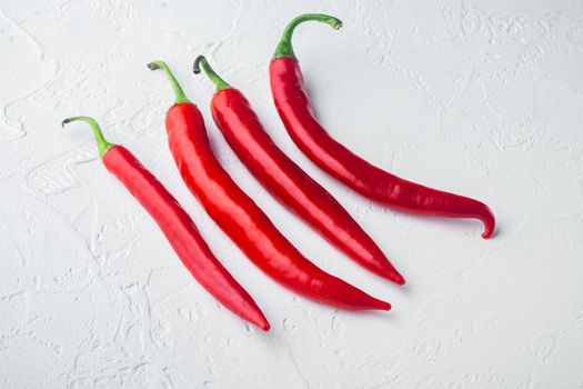 Whole red chili peppers set, on white background