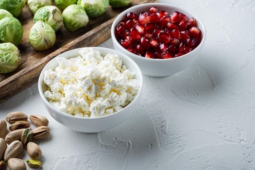 Cottage cheese, curd, on white textured background