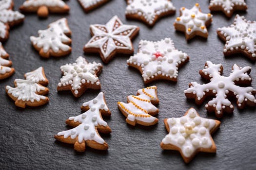 Homemade christmas cookies on slate background
