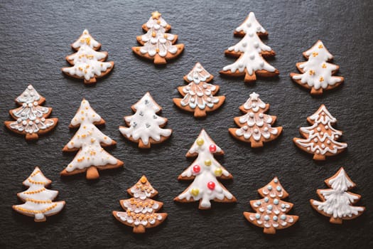 Homemade christmas cookies on slate background