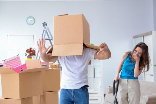 Young family moving to new apartment