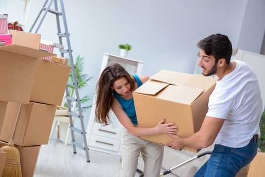 Young family moving to new apartment