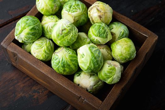 Raw brussels sprouts, on old wooden table