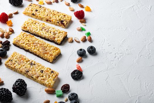 Set of healthy granola, muesli and cereal bars with space for text, on white background