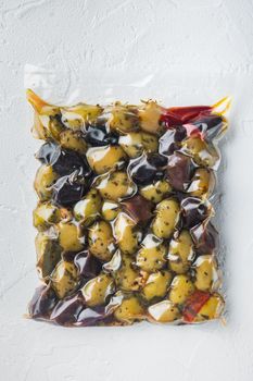Greek olives fresh, on white background, top view