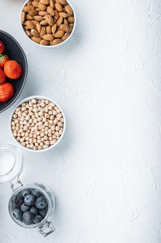 Organic food for healthy nutrition, superfoods, flat lay with space for text, on white background.