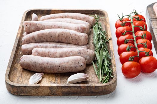 Traditional chicken sausages, on white background.