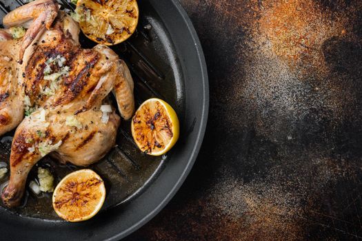 Roasted golden chicken, on old rustic background, top view with copy space for text