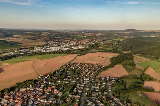 Aerial view at a landscape in Germany, Rhineland Palatinate near Bad Sobernheim with  meadow, farmland, forest, hills, mountains 