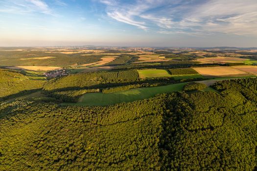 Aerial view at a landscape in Germany, Rhineland Palatinate near Bad Sobernheim with  meadow, farmland, forest, hills, mountains 