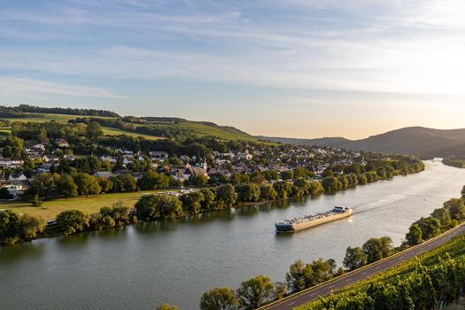 Panoramic view of the Moselle valley with the wine village Brauneberg in the background on a sunny autumn day