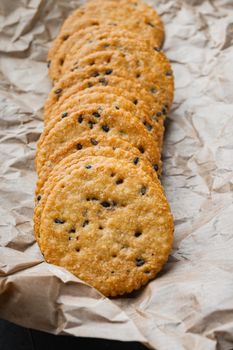 Crackers with flax seed set, on black background