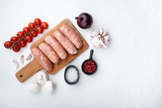 Traditional mest sausages, flat lay with space for text, on white background.