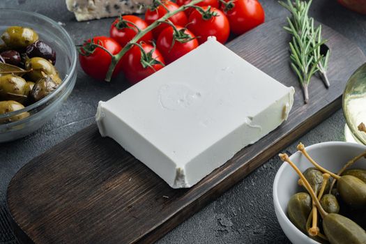 Traditional greek feta cheese set, on gray background