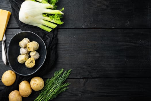 Artichoke with fennel, potato and parmesan ingredient, on black wooden table, flat lay with space for text