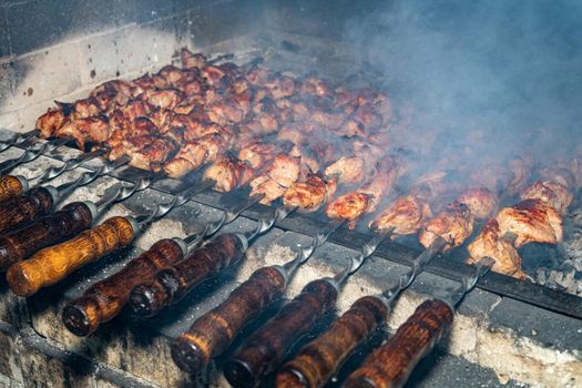 Frying kebabs. Cooking delicious barbecue. Ancient recipe for cooking.