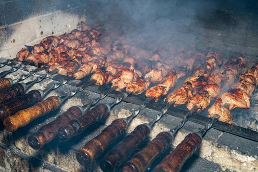 Frying kebabs. Cooking delicious barbecue. Ancient recipe for cooking.