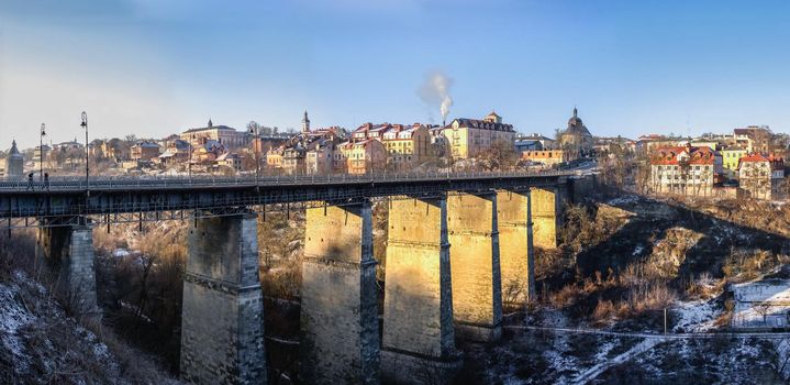 Kamianets-Podilskyi, Ukraine 01.07.2020. Novoplanovsky bridge over the Smotrytsky canyon in Kamianets-Podilskyi on a sunny winter morning