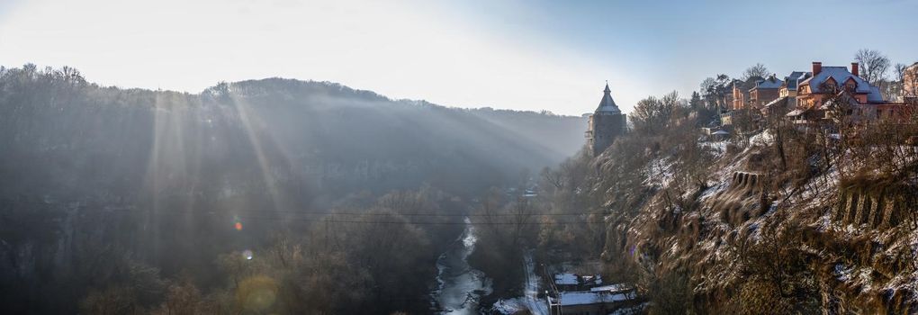 Kamianets-Podilskyi, Ukraine 01.07.2020. Smotrytsky canyon and river around the Kamianets-Podilskyi fortress on a sunny winter morning