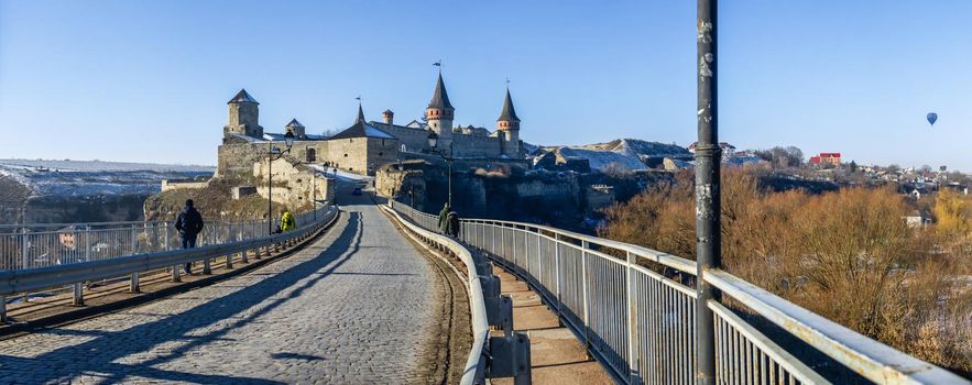 Kamianets-Podilskyi, Ukraine 01.07.2020. Panoramic view of the Castle bridge to Kamianets-Podilskyi fortress on a sunny winter morning