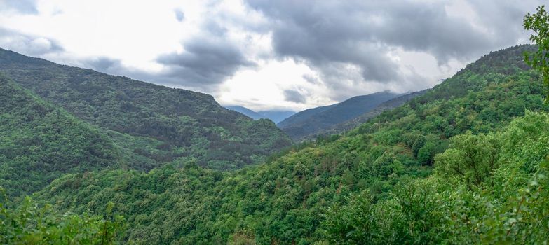 Asenovgrad, Bulgaria 24.07.2019. Bulgarian Rhodope mountain view from the side of the Asens Fortress on a cloudy summer day