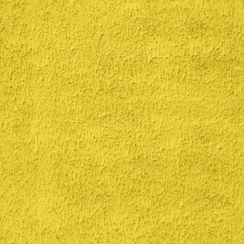 seamless illuminating yellow color flat plaster wall with lamb or shuba pattern.