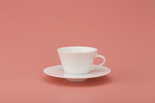 White glossy coffee cup on creamy beige background with copy space. High quality photo