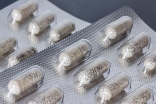 Pills / medicine lying on the table, flu season, close up