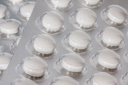 Pills / medicine lying on the table, flu season, close up