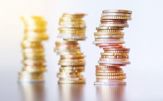 Coins stacked on each other, close up picture, money concept