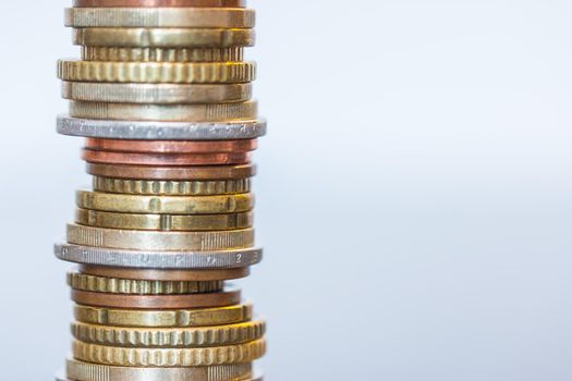 Coins stacked on each other, close up picture, money concept