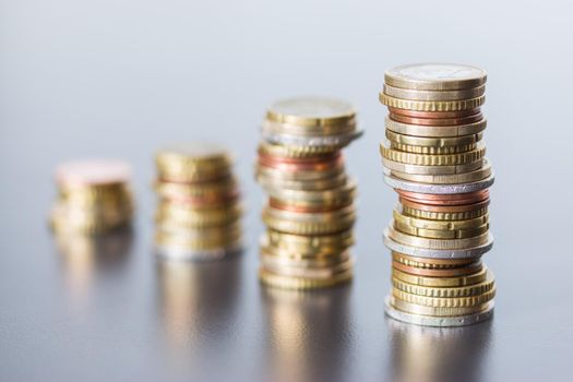 Coins stacked on each other, close up picture, money concept