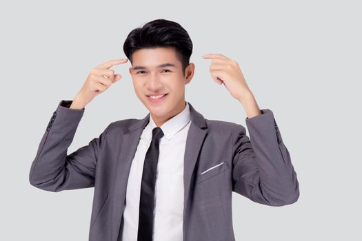 Portrait young asian business man in suit with smart thinking idea with intelligent isolated on white background, businessman standing and planning for success, manager or executive pointing head.