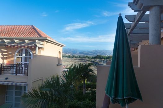 View of holiday apartment complex with swimming pool in Meloneras, Gran Canaria in Spain.