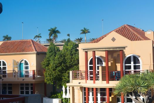 View of holiday apartment complex with swimming pool in Meloneras, Gran Canaria in Spain.