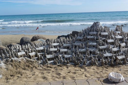 Christmas Village of sand on the beach of Cran Canaria in Meloneras