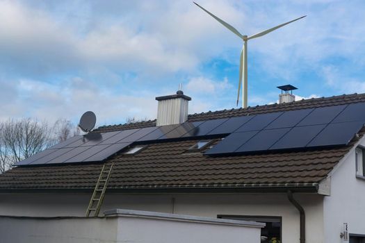 Modern house with a photovoltaic system, solar panels for electricity generation